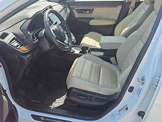 Хонда CRV 2021г Гибрит Белый кузов Комплектация Touring Бензин Полный привод 4х4 Донецк