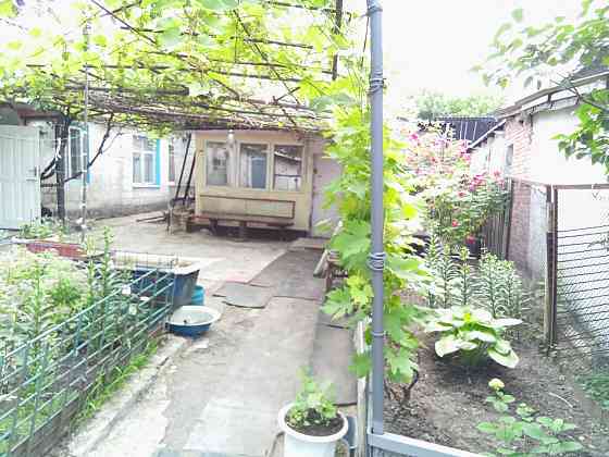 Продажа квартиры на земле, состоящей из двух домов Донецк