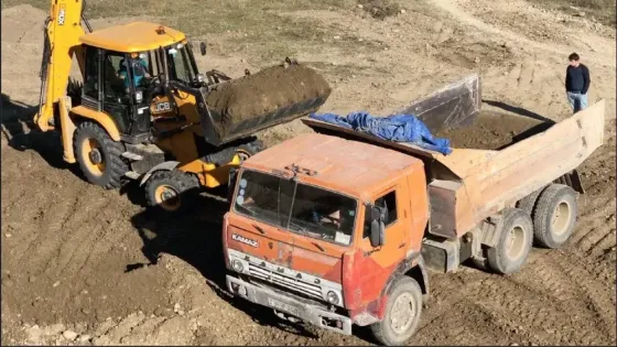 Услуги Трактора и Камаза Вывоз строительного мусора Донецк