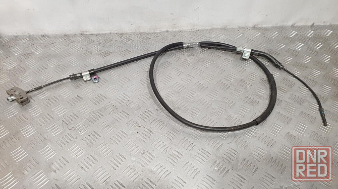 Трос стояночного тормоза основной 597503S300 Hyundai Sonata разборка Херсон - изображение 1