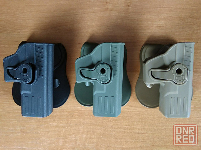 Пластиковая поясная кобура для пистолета Glock 17/19 с замком. Новая! Херсон - изображение 1
