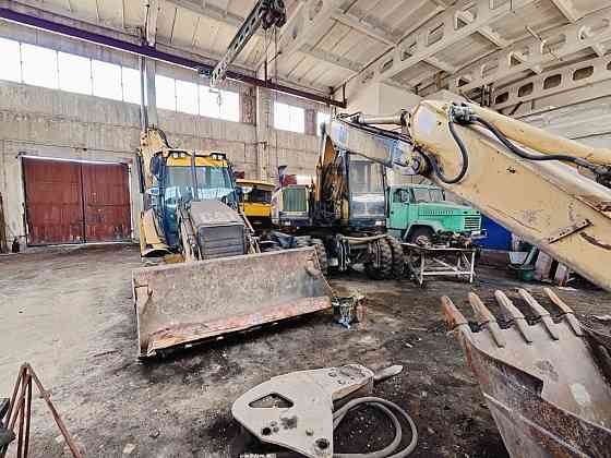 Экскаватор погрузчик CAT 428 E с гидромолотом и 3 ковшами Запорожье