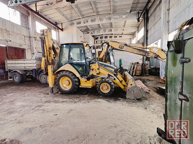Экскаватор погрузчик CAT 428 E с гидромолотом и 3 ковшами Запорожье - изображение 1